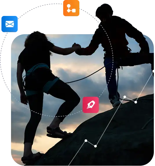 Two climbers helping each other at the summit, symbolising the spirit of collaboration in the Lleida.net Partner Programme.